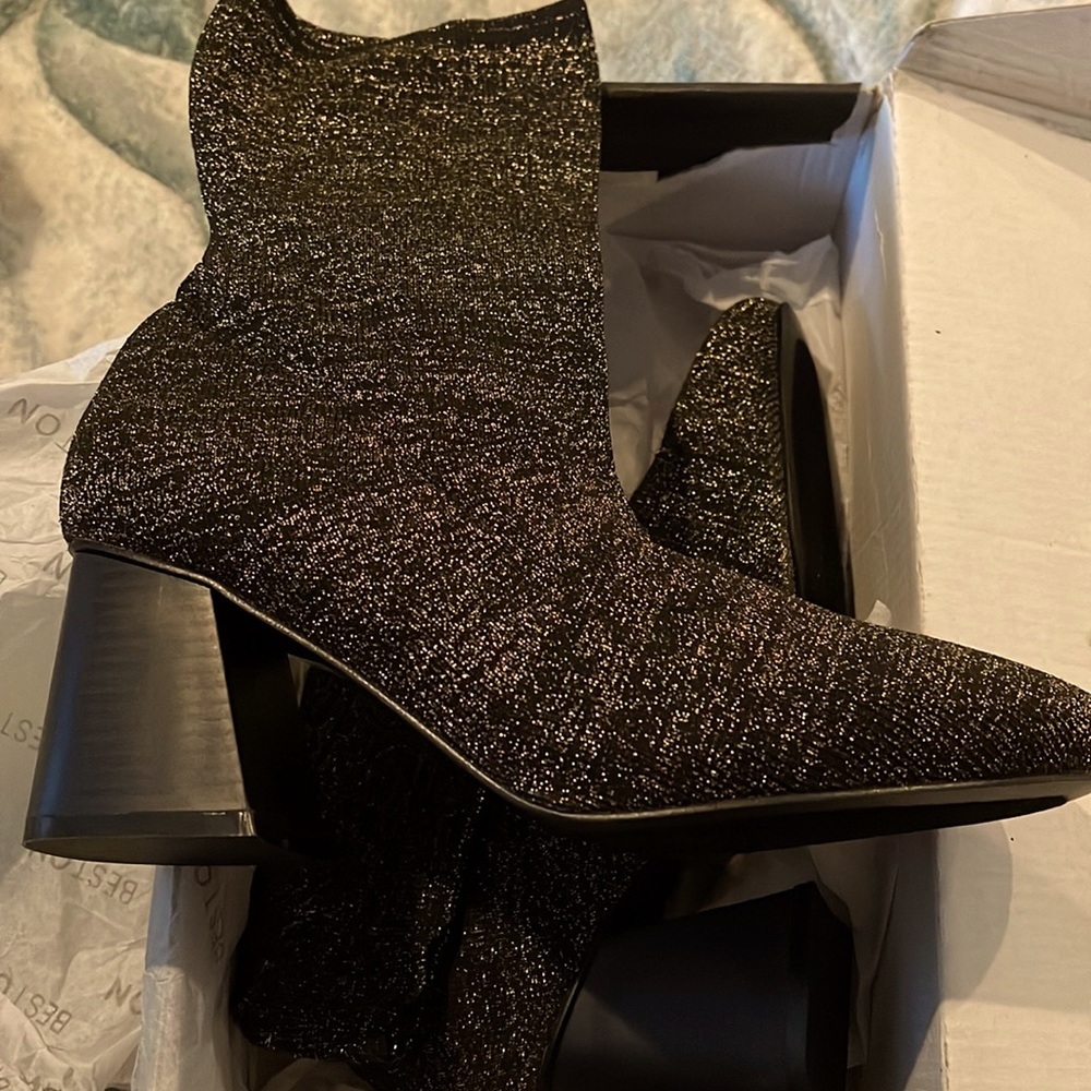 Gold and black shoes
